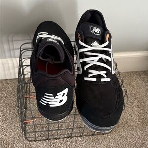 New Balance Black and White baseball cleats